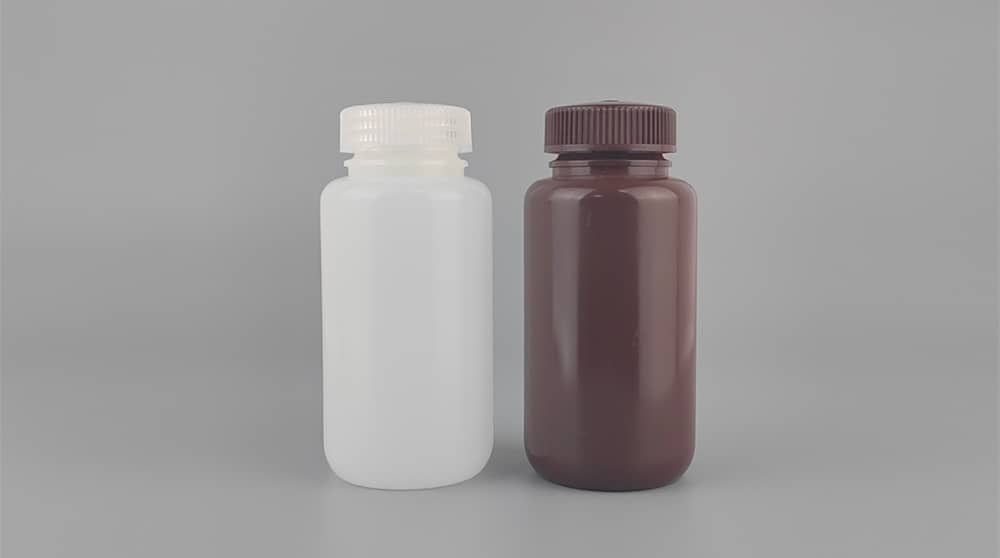 Best Bottles for Developer Solution Storage and Transport 9 Translucent and brown HDPE plastic developer solution storage bottles, demonstrating chemical-resistant packaging options for PCB manufacturing and laboratory applications.