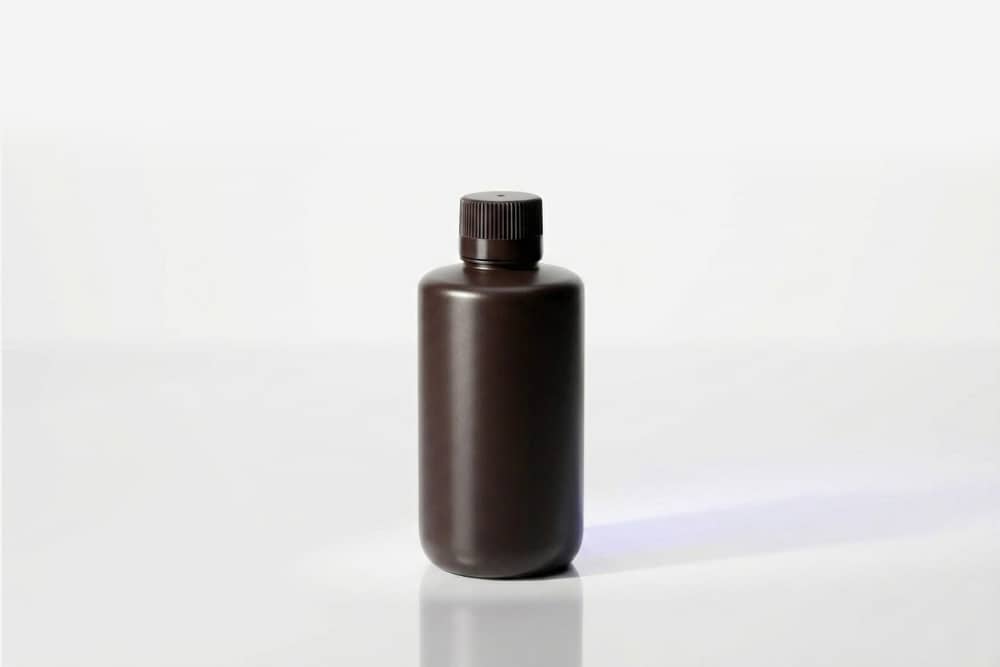 Amber HDPE and PP narrow-mouth photoresist bottle demonstrating certified UV protection against light-induced chemical degradation.
