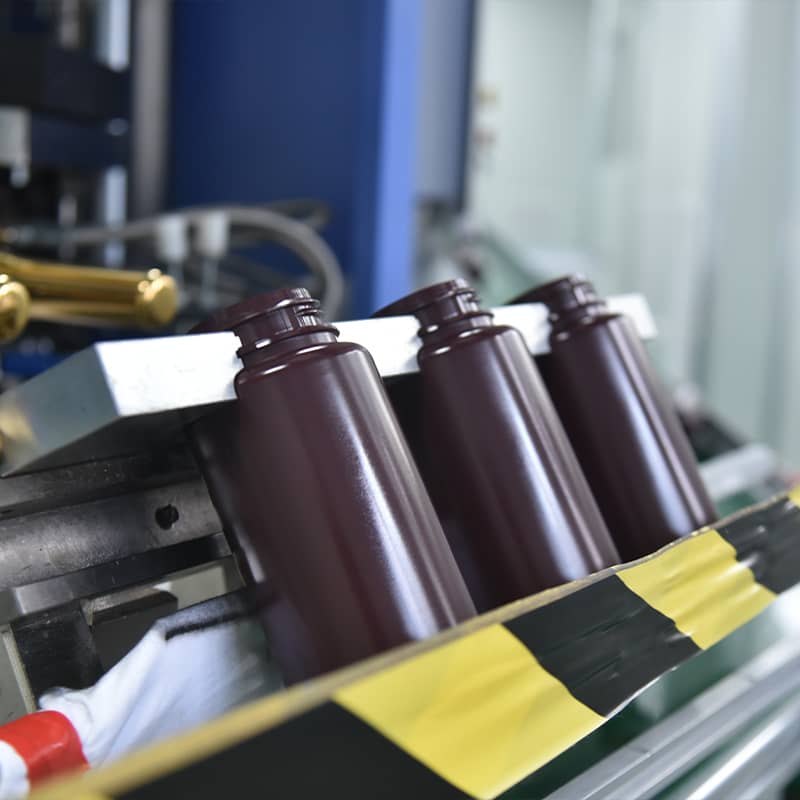 Amber Plastic Reagent Bottles on Automated Production Line